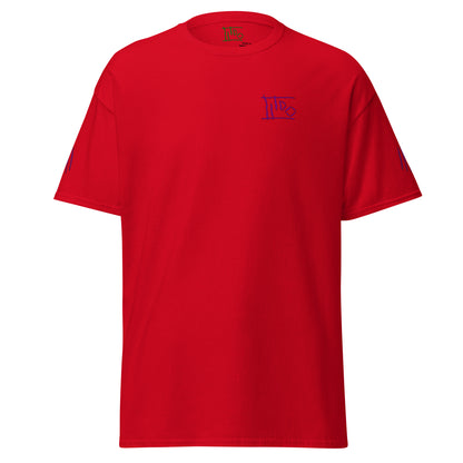A bright red short-sleeve crewneck t-shirt with a small dark purple 'IT'S' graphic printed on the left chest, displayed on a clean white background.